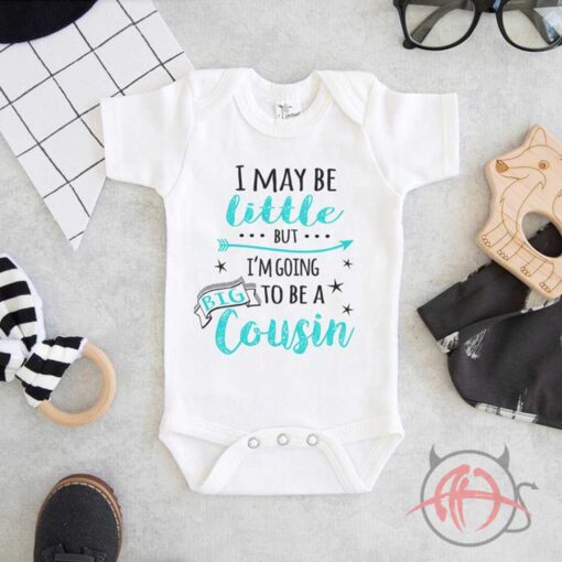 I May Be Little But I'm Going To Be A Big Cousin Baby Onesie